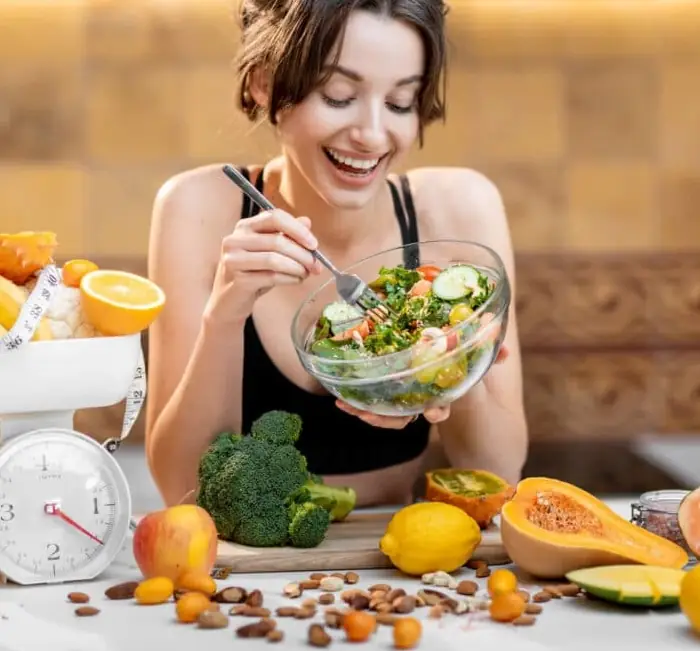 Woman enjoying a fiber-rich, balanced meal